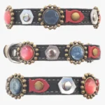 All-sides view of the black leather “Abyss Glow” cat collar featuring luxury red and grey stones, silver accents and a vibrant jeweled ocean-inspired design.