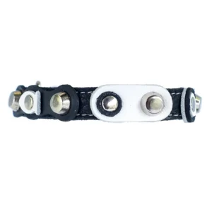 Handmade cat collar in black‑white leather & silver studs, modern elegant with a retro‑studded flair for confident cats who enjoy bold style.