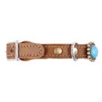 Left‑side view of a black leather cat collar with turquoise luxury stones in the “Bohemian Jewel” design, featuring a secure adjustable buckle, a subtle elastic safety release, and a clean bright beige inner layer on a white background.
