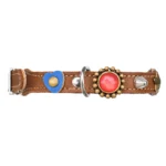 Left-side view of a brown leather cat collar with red‑white‑blue hearts & stones, featuring a Safety closure with Anti-entanglement protection, adjustable buckle with elastic and Quick release breakaway system.