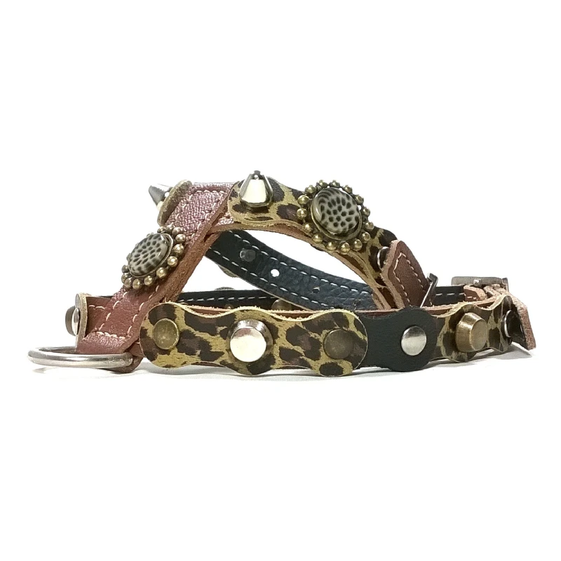 “Camouflage Luxe” Leather Dog Harness – Right Side View Dog harness featuring layered brown and black leather, leopard‑print details, mixed‑metal studs, ornate circular pieces and silver rounded spikes, shown from the right side.