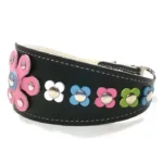 Left‑side view of the handmade “Pastel Pop Luxe” greyhound collar in black leather, featuring a sculpted pastel pink flower with a soft, vibrant finish. The curved silhouette suits a Greyhound, and adds the same bright floral look to Vizslas and Australian Shepherds.