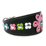 Right‑side view of the artisanal “Pastel Pop Luxe” greyhound collar in black leather, showing the bold pink flower with clean stitching and a cheerful pastel tone. The tapered shape fits an Italian Greyhound, and brings the same expressive, colorful style to Shiba Inus and Border Collies.