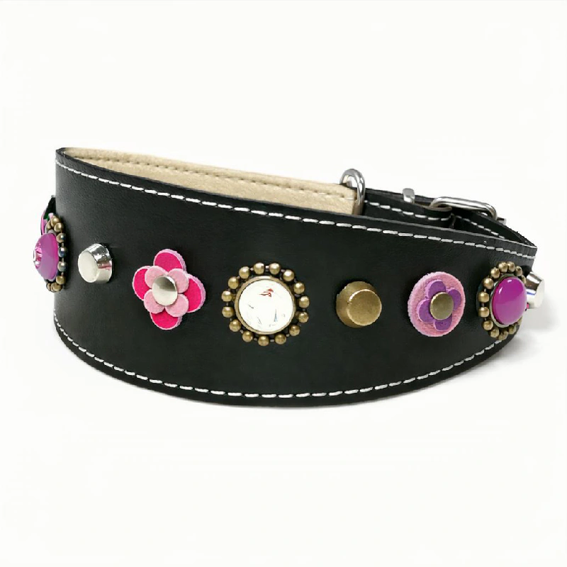 Leather Greyhound Collar “Pink Blossom Bite” with Purple Fuchsia & Pink Leather Flowers – Left Side Left‑side view of the handcrafted “Pink Blossom Bite” greyhound collar, featuring layered purple fuchsia and pink leather flowers on smooth black leather with a soft light inner lining. The curved silhouette suits the long, elegant neck of a Greyhound, and brings the same vibrant, expressive floral character to Italian Greyhounds and Papillons, whose lively, delicate features complement the bold colors.