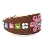 Right‑side view of the artisanal “Pastel Pop Luxe” greyhound collar in brown leather, showing the bold pink leather flower with clean stitching and a colorful pastel look. The tapered silhouette fits an Italian Greyhound, and offers the same expressive charm to Shiba Inus and Border Collies.