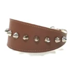 Left‑side view of the handcrafted brown leather “Punk” greyhound collar with silver spikes, displayed on warm‑natured breeds such as the Galgo Español, Golden Retriever, and Cocker Spaniel, enhancing its earthy, handmade character.