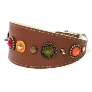 Left‑side view of the handmade “Sweet Honey” greyhound collar in warm brown leather, decorated with orange, yellow, and red stones inspired by honey and nature. Its elegant shape suits a Greyhound and brings the same warm, vibrant look to Whippets and Silken Windsprites.