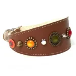 Right‑side view of the artisanal “Sweet Honey” greyhound collar in brown leather, featuring bright orange, yellow, and red stones with a warm, bee‑inspired glow. The refined design fits a Greyhound and reflects the same natural charm on Italian Greyhounds and Cocker Spaniels.